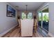 Dining room with sliding glass doors to backyard at 600 Nasturtium Ct, Nokomis, FL 34275