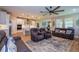 Open concept living room with kitchen and recessed lighting at 600 Nasturtium Ct, Nokomis, FL 34275