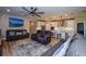 Open concept living room and kitchen with hardwood floors at 600 Nasturtium Ct, Nokomis, FL 34275