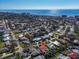 Wide aerial shot showing property with its surroundings near the ocean and city at 612 Cadiz Rd, Venice, FL 34285