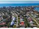 Elevated view of the property with the coastal city and intercoastal waterways in the background at 612 Cadiz Rd, Venice, FL 34285