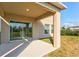 Covered patio featuring seamless access to the outdoors through sliding glass doors at 6341 Milestone Loop, Palmetto, FL 34221