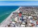 Stunning aerial view of coastal condo, showcasing beach access and vibrant community at 700 Golden Beach Blvd # 221, Venice, FL 34285