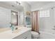 Bathroom includes shower, toilet and sink at 7145 Lakeside Dr, Sarasota, FL 34243