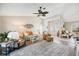 Inviting living room with stylish furniture, neutral tones, and ample natural light at 734 Sugarwood Way, Venice, FL 34292