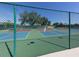 Tennis courts with blue and green surfaces at 748 White Pine Tree Rd # 208, Venice, FL 34285