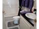 Bathroom featuring a toilet, tub, shower combination, and a white vanity at 749 N Green Cir, Venice, FL 34285