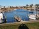 Picturesque waterfront view with boats docked, providing serene marina ambiance at 749 N Green Cir, Venice, FL 34285