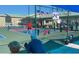 Active pickleball court with players and patriotic decorations, enhancing the community's recreational amenities at 749 N Green Cir, Venice, FL 34285