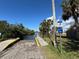 Public boat ramp and canal with dock and posted rules at 807 Lucille Ave, Nokomis, FL 34275