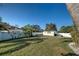 Large backyard with a shed, privacy fence, and room to play, plant, and entertain at 8475 Chesapeake Ave, North Port, FL 34291