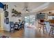 Dining room with seating for four and sliding glass doors to the outdoor patio at 8475 Chesapeake Ave, North Port, FL 34291