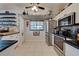 Bright kitchen with stainless steel appliances and a functional layout for cooking at 8475 Chesapeake Ave, North Port, FL 34291