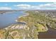 Beautiful aerial view of a boat launch area, showcasing the surrounding waterfront and natural landscape at 9790 Parkwood Ct, Seminole, FL 33777