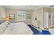 Bright bedroom with a window view, featuring a nautical-themed decor scheme at 10181 Colubrina Dr, Venice, FL 34293