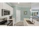 Bright kitchen featuring white cabinets, stainless steel appliances and light countertops at 10181 Colubrina Dr, Venice, FL 34293