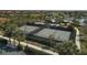 Active pickle ball courts showcasing players in action on well-kept surfaces, surrounded by lush landscaping at 10181 Colubrina Dr, Venice, FL 34293