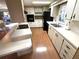 Spacious kitchen with modern appliances, generous counter space, and a functional layout perfect for cooking and entertaining at 105 Lakeview Dr, North Port, FL 34287