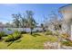 Spacious backyard with lush landscaping, providing a serene outdoor oasis at 1181 Southland Rd, Venice, FL 34293