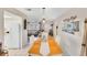 Dining area with a chandelier, with views into the living room and kitchen at 1181 Southland Rd, Venice, FL 34293
