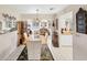 Inviting dining room with a decorative chandelier and neutral decor at 1181 Southland Rd, Venice, FL 34293