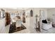 Cozy dining space that features a chandelier, an adjacent kitchen and sitting area at 1181 Southland Rd, Venice, FL 34293