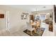 Bright dining room featuring a chandelier, and access to the living area at 1181 Southland Rd, Venice, FL 34293