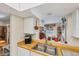 Kitchen view showcasing the sink, wooden countertops and connection to the dining area at 1181 Southland Rd, Venice, FL 34293