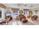 Inviting living room with a comfortable seating area and natural light from the windows at 1181 Southland Rd, Venice, FL 34293