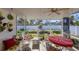 Charming screened-in patio with view of landscaped backyard, perfect for relaxation at 1181 Southland Rd, Venice, FL 34293