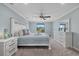 Light filled bedroom with view to the outside at 12279 Canavese Ln, Venice, FL 34293