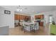 Beautiful kitchen featuring a large island with seating and stainless steel appliances at 12279 Canavese Ln, Venice, FL 34293