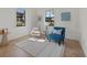 Bright living room with tile floors and ample natural light at 12279 Canavese Ln, Venice, FL 34293