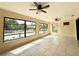 Bright sunroom with large windows offering backyard views and great natural light at 12321 Alta Mira St, North Port, FL 34287