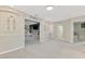 Upstairs landing with access to secondary rooms and decorative window treatments at 12410 Cinqueterre Dr, Venice, FL 34293
