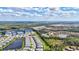 Panoramic aerial view of a planned community with ponds, lakes, and natural preserves at 12505 Palatka Dr, Venice, FL 34293
