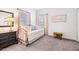 Cozy bedroom featuring soft grey carpet, a stylish daybed, and light pink curtains for a relaxing atmosphere at 12505 Palatka Dr, Venice, FL 34293
