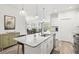 Open kitchen featuring a large island and view of the living area at 12505 Palatka Dr, Venice, FL 34293
