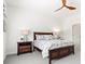 Bright main bedroom with ceiling fan, bedside tables, and neutral paint at 12505 Palatka Dr, Venice, FL 34293