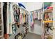 Spacious walk-in closet with ample shelving and hanging space for organization at 12505 Palatka Dr, Venice, FL 34293