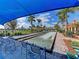 Bocce ball court surrounded by lush greenery, providing a recreational area for residents to enjoy at 13278 Huerta St, Venice, FL 34293