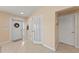 Inviting foyer with neutral walls, tile flooring, offering a warm welcome to the home at 13278 Huerta St, Venice, FL 34293