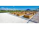 Community garden with rows of raised garden beds at 13278 Huerta St, Venice, FL 34293