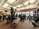 Well-equipped gym with modern exercise machines and ample natural light, promoting a healthy lifestyle at 13278 Huerta St, Venice, FL 34293