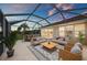Open concept screened patio area is perfect for entertaining and relaxing at 13278 Huerta St, Venice, FL 34293