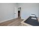 This bedroom features hard wood floors, a desk, and light blue walls at 13341 Drummond Ave, Port Charlotte, FL 33953