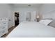Airy bedroom with closet and ensuite entrances at 13341 Drummond Ave, Port Charlotte, FL 33953