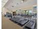 Gym featuring new treadmills with TVs and large windows for natural light at 1342 Maseno Dr, Venice, FL 34292