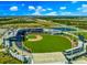 Aerial view of a baseball stadium and surrounding suburban landscape at 13730 Vancanza, Venice, FL 34293
