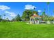 Picturesque gazebo nestled within a lush green park, offering a serene and inviting community space at 13730 Vancanza, Venice, FL 34293
